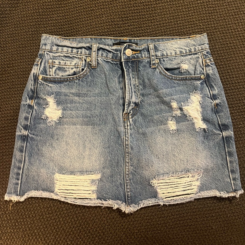 Jean skirts. Rips- size small. Buttons- size 27.